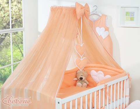 Duża moskitiera do łóżeczka dziecięcego z szyfonu z wiszącymi serduszkami i kokardką - brzoskwiniowa